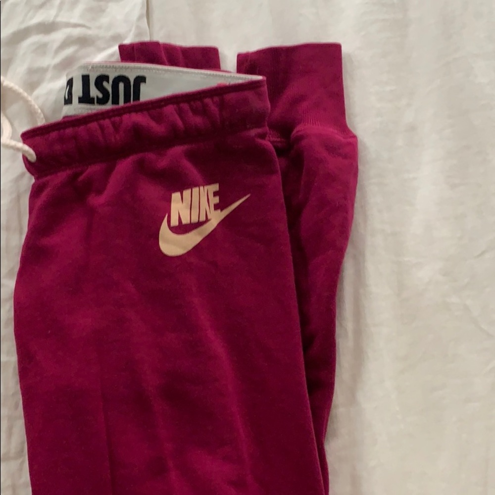 Maroon Nike sweats